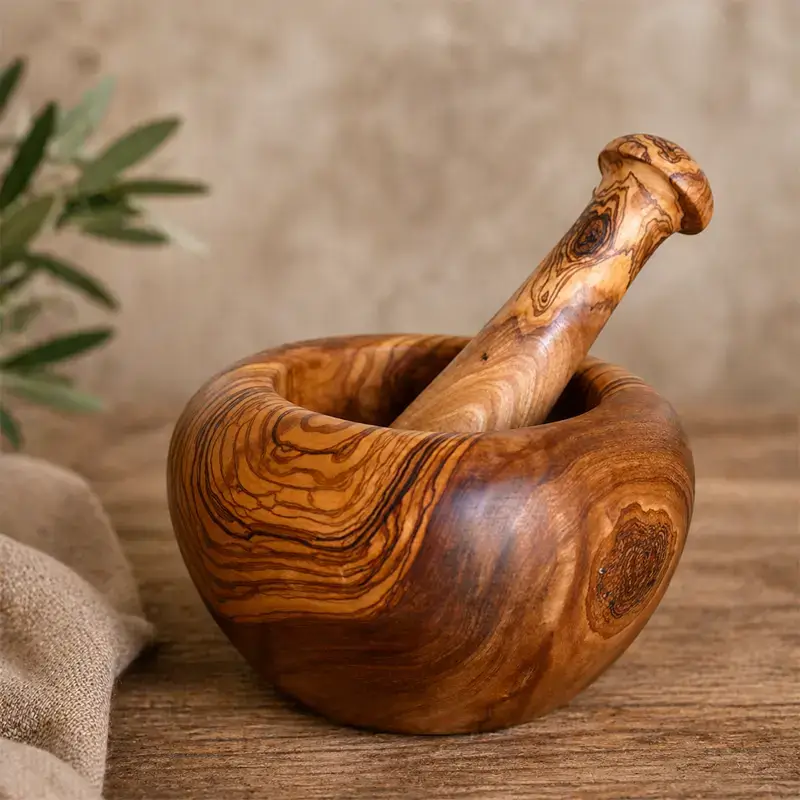 olivenholz-moerser-handgefertigt-robust.jpg olivenholz-moerser-massiv-naturholz.jpg